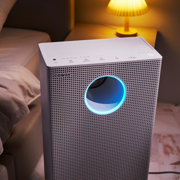 Coway Storm II circulating clean air in a bedroom