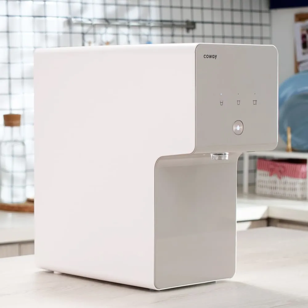 Coway Cinnamon water purifier in a kitchen
